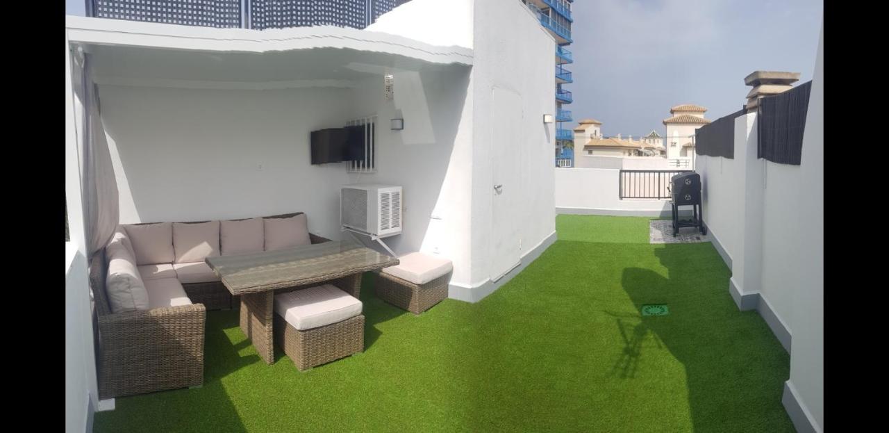 אל קאמפיו Atico Triplex Isla Verde מראה חיצוני תמונה